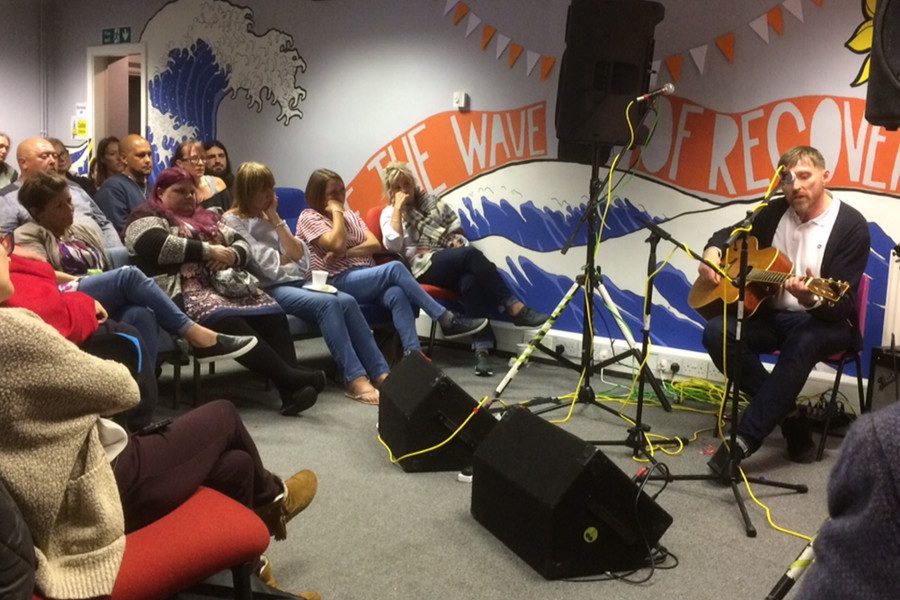 Guitarist with crowd