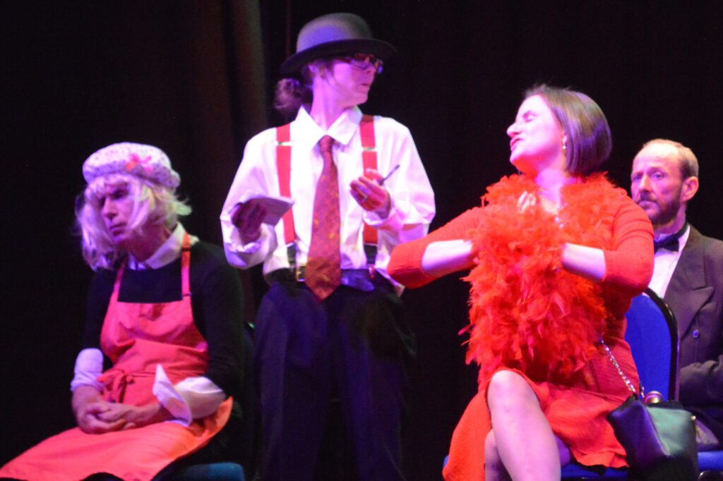 Miss Scarlet and a detective