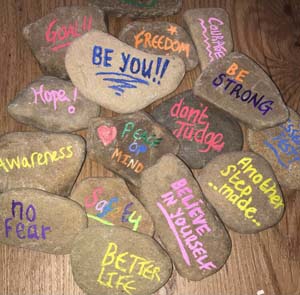 Pebbles with positive messages